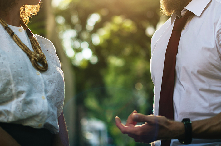 Woman and man talking